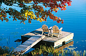 Adirondack chairs in a dock in autumn. Starlight. Pennsylvania. USA