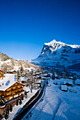 View over Grindelwald with mountain Wetterhorn in background, Grindelwald, Bernese Oberland, Canton of Bern, Switzerland