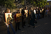 People holding icons at a procession, Orthodox icon procession, Agros, Troodos mountains, South Cyprus, Cyprus