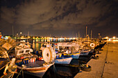 Fishing boats at night in the fishing port, Harbour, Paphos, South Cyprus, Cyprus
