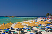 Nissi Beach with sun loungers and sunshades, Agia Napa, South Cyprus, Cyprus