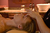 Woman enjoying a wellness massage, Le Meridien Limassol Spa and Resort, Hotel, Limassol, Cyprus
