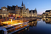Old Town of Ghent at night with reflection in the water, Flanders, Belgium
