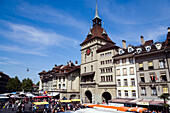 People shopping at a market near Kaefigturm, Baerenplatz, Old City of Berne, Berne, Switzerland