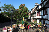 Pavement cafe near Spalenturm, former city gate in the city walls of Basel, Basel, Switzerland