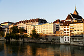 Riverbank with St. Martins Church in the background, River Rhine, Basel, Switzerland
