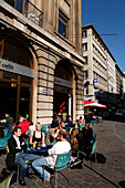 People sitting in a pavement cafe, Gerbergasse, Basel, Switzerland