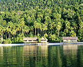 Houses on stilts of the diving resort Irian Diving . Archipelago of Raja Ampat. Papua, Indonesia