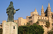 Monument to Ramon Llull and Almudaina palace in background. Palma de Mallorca. Majorca, Balearic Islands. Spain