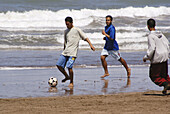 Men playing soccer. Azemmour. Morocco. Africa