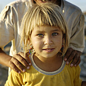 Young girl with golden eyes. Harran. Anatolia, Turkey