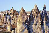 Rock dwellings and formations near Göreme, Cappadocia. Turkey.