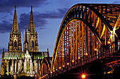 Cathedral and Hohenzollern Bridge at night. Cologne. Germany