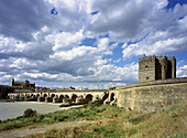 Roman bridge over Guadalquivir River and La Calahorra tower, with the mosque in backgroud. Córdoba. Spain