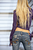  Adult, Adults, Back view, Blonde, Blondes, Blue jean, Blue jeans, Cell phone, Cell phones, Cellular phone, Cellular phones, Color, Colour, Communication, Communications, Contemporary, Denim, Fair-haired, Female, Human, Indoor, Indoors, Inside, Interior, 