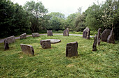 Circle of standing stones, recreation of an old Celtic village. Irish National Heritage Park, Ferrycarrig. Co. Wexford, Ireland