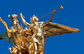 Statues at Alexandre III Bridge. Paris. France.