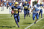 Northern vs. Utica Eisenhower High School football action. Port Huron. Michigan. USA
