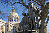 The Capitol Capital Building and grounds complex in Atlanta Georgia GA and statue of former Governor Joseph Emerson Brown and wife