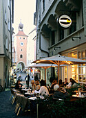 Pavement cafe in Old Town, Regensburg, Bavaria, Germany