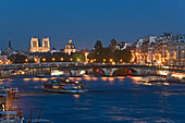 Night shot of the river Seine with bridges and Notre Dame, Paris, France, Europe