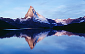 Matterhorn (4478m). Reflection at Stellisee (Stelli) Lake. Alps. Valais. Switzerland.