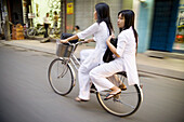 Girls in white. Ho Chi Minh City. Vietnam