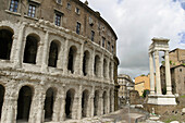 Teatro Marcello (Marcellos theatre) and columns from Apollo Sosianos Temple. Rome. Italy