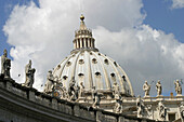 Statues and Dome of St. Peters Basilica. Vatican City. Rome. Italy