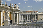 Statue of Saint Paul, and Colonnade. St. Peters Square. Vatican City. Rome. Italy