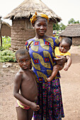 Portrait of young Gan woman with children, Loropeni. Burkina Faso