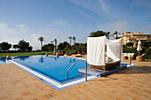Sunbed and Swimming Pool at St. Regis Mardavall Mallorca Hotel and Spa, Calvia, Mallorca, Balearic Islands, Spain