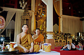 Monks in Wat Phra Sing temple, Chiang Mai, North Thailand, Thailand