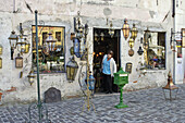 Bassano del Grappa hill town in the foothills of the Dolomites a exterior display of an old lamp shop. Veneto. Italy.