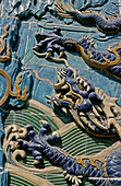 The Nine Dragons Wall in Beihai park. Beijing. China.