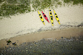 Kayaks on sand seashore, aerial view. Haväng. Skåne. Sweden.