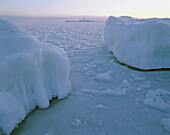 Light house, winter sea, ice formation, Gulf of Bothnia, morning light. Skellefteå. Västerbotten. Sweden.