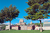 Lower town with Château Frontenac through trees. Quebec city. Quebec. Canada.