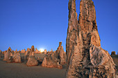 Full moon rising over The Pinnacles Desert, Nambung National Park, Western Australia. Australia