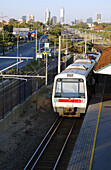 Morning commuter train into the city, Meltham Station, Perth, Western Australia.