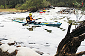 Kayakers negotiating Syds Rapids in Walyunga National Park as part of the Avon Descent, a famous whitewater race near Perth, Western Australia