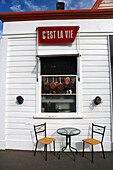 Cest la vie. French restaurant with al fresco dining on the street in historic Akaroa, Banks Peninsula, New Zealand.