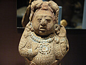 Figurine (late classic period, 550 - 900 A.D.), Maya sculpture in museum. Mérida, Yucatán. Mexico