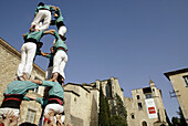 Castellers human towers builders, Catalan tradition. Plaça de Sant Domènech, Girona. Catalonia, Spain