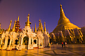 Plaza at the Shewedagon Pagoda (main pagoda on right side), Yangon, Myanmar (Burma)