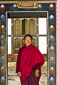 Novice monk at Tamshing Monastery, Tamshing village, Bumthang Village, Bhutan