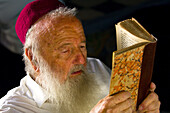 Rabbi reading sidur, El Ghriba Synagogue, Djerba Island, Tunisia