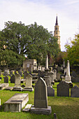 Historic graveyard of Circular Congregation Church in the historic center of Charleston, South Carolina (with St. Philips Episcopal Church in background)