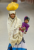 Woman holding child, Agra, Uttar Pradesh, India