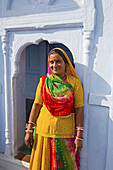 Woman outside a house, Osian, Rajasthan, India